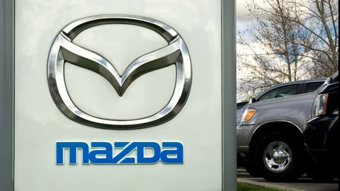 SANTA CLARITA, CA/USA - MARCH 1, 2015: Mazda automobile dealership and sign. Mazda Motor Corporation is a Japanese automaker.