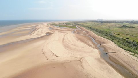 Aerial Drone Shot looking along Holkham Bay Sand Dunes, North Norfolk, UK