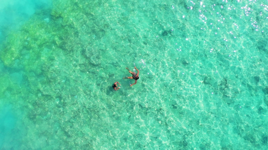 two girls swimming on clear crystal Stock Footage Video (100% Royalty ...