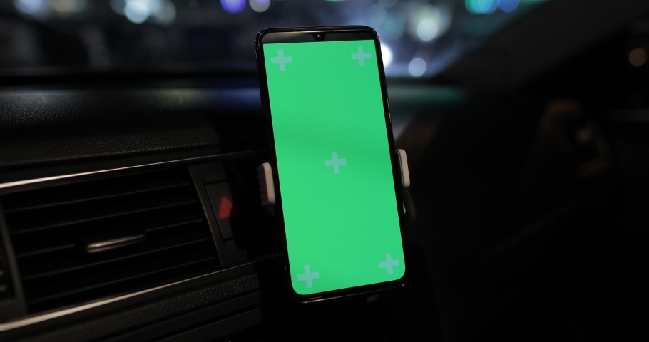 Using empty screen of smartphone at night in a car, mockup Royalty-Free Stock Footage #1044681736