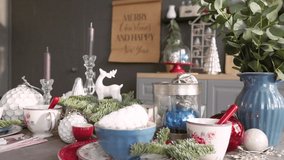 A decorated christmas dining table with champagne glasses and christmas tree in background. - Powered by Shutterstock - Get 15% off with code: PIKWIZARD15