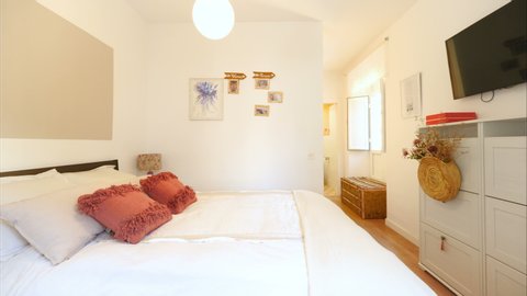 Malaga, Spain.Circa January 2020. Real estate virtual tour. Camera fly-through the interior of a cozy home. Boho chic bedroom