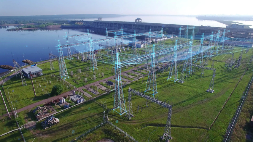 An aerial view a hydroelectric power station with infographic power flows motion graphics. Electric substation with tall pylons and hog voltage distribution cables. Early morning spring summer sun. | Shutterstock HD Video #1044723850