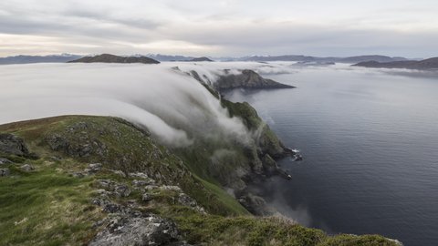 Inversion flowing over the cliff