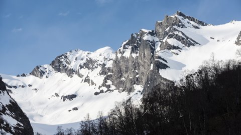 Mountains with fallen avalanche fields