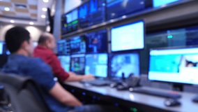 Engineer group looking to work in the electrical control room footage 4K - Powered by Shutterstock - Get 15% off with code: PIKWIZARD15