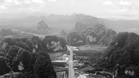 Black and white landscape mountain view and rural road aerial view from drone