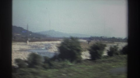 TAIWAN-1982: Rocky Drive Along The Road With Power Lines And Taking A Video With Glitching Camera