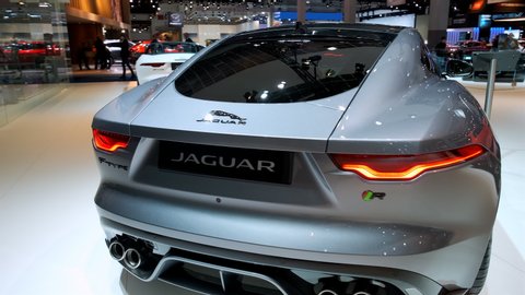BRUSSELS, BELGIUM - JANUARY 9, 2020: Jaguar F-Type Coupe 2020 facelift sports car on display at Brussels Expo. Handheld gimbal shot around the car.