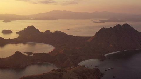 The best aerial view of the famous hiking hills and island for the tourist in Komodo National Park called Padar Island during sunset in East Nusa Tenggara, Indonesia.