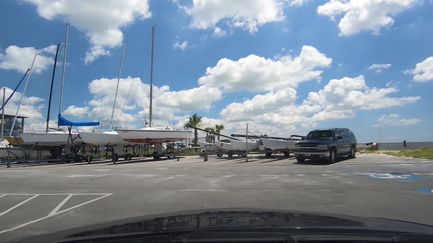Driving past boats parked at Biloxi, Mississippi