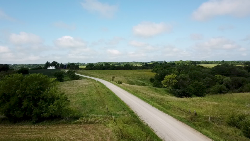 Aerial approach to farmhouse in Chelsea, Iowa