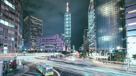 8k timelapse of busy intersection in Taipei city at night, Taiwan