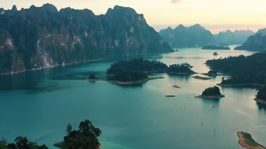 Drone video on Lake Cheow Lan Lake, breathtaking views of the mountains of wildlife and the blue lake, Thailand, Phuket protected places, rainforests, a trip to Thailand with a drone.