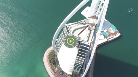 DUBAI, UNITED ARAB EMIRATES - JANUARY 2, 2020. Aerial shot of the Burj Al Arab hotel helipad and the beach