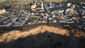 4K high quality sunny sunrise morning aerial panorama footage of spectacular scenic The Big Hole old diamond mine site, mine shaft towers in Kimberley, capital of Northern Cape province, South Africa