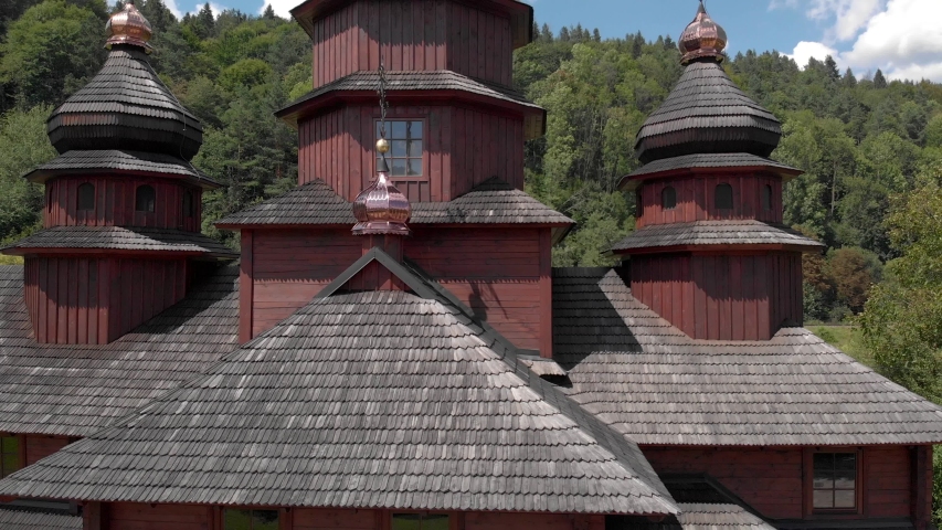 Old wooden church. Ancient wooden church in Carpathians, Ukraine. Folk architecture of Transcarpathia.