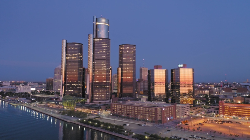 Aerial: Detroit city skyline at sunset. Detroit, Michigan, USA. 