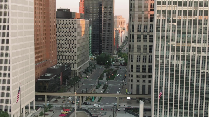 Aerial: Detroit city skyline at sunrise. Detroit, Michigan, USA.