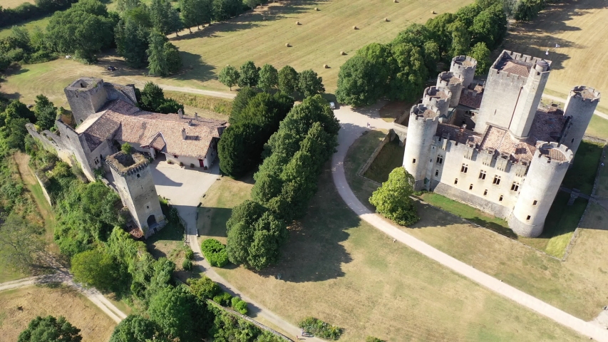 Summer view of medieval castle Chateau de Roquetaillade, Gironde, France