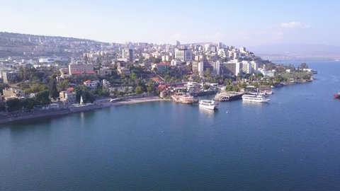 Sea of Galilee in Tiberias, Israel. Aerial view of the coastline, the old city and the hotels zone.