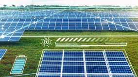 Aerial view of Solar Panels Farm with animation graphics of flowing energy lines. Drone flight fly over solar cell panels field. Renewable Alternative Green Energy Concept. Future city technology - Powered by Shutterstock - Get 15% off with code: PIKWIZARD15