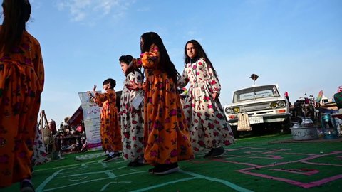 Riyadh, Saudi Arabia - January 18th 2020: Group of young girls perform traditional dance on in a traditional festival in Riyadh, Saudi Arabia.