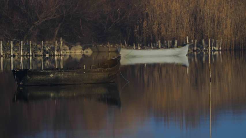 boat on mountin lake in cold season