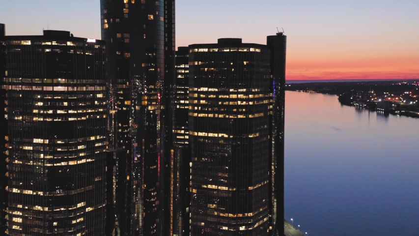 Aerial: GM Renaissance Center & Downtown Detroit at night, Michigan, USA. 18 September 2019
