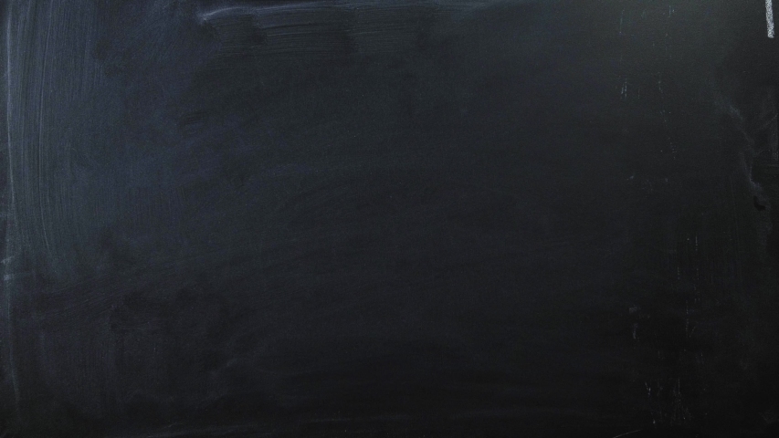 The formula of the theory of relativity on the blackboard. Male hand writes Einstein