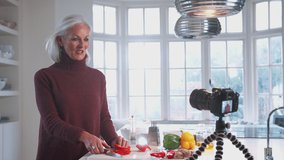 Mature Woman Vlogger Making Social Media Video About Cooking For The Internet