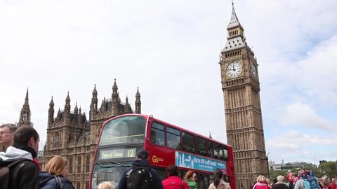 London / England - 4th May 2019: Big Ben, parliament with tourists  in Westminster, London, United Kingdom