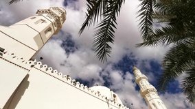 Clips video of Quba Mosque or Masjid Kuba exterior building with cloud movement. Muslim pilgrims visiting Quba Mosque during hajj or umrah season.  Black and White. 25 frame rate per seconds