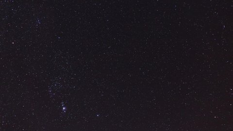 4K video time lapse of constellation Orion with visible stars Betelgeuse and Rigel. Orion nebula and flame nebula and Rosette nebula. Messier 42 and Alnitak,  Alnilam, Mintaka star