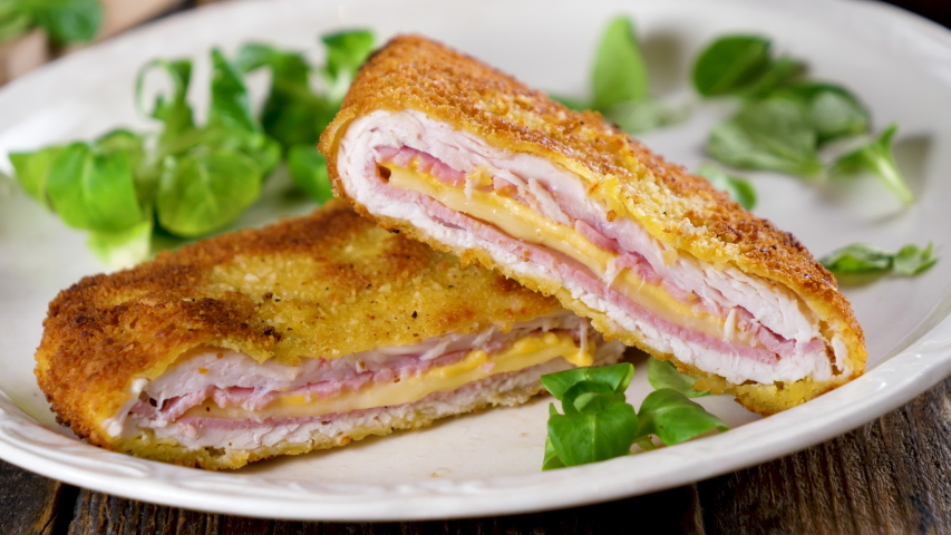 cordon bleu, chicken fillet with ham and cheese Royalty-Free Stock Footage #1045144288