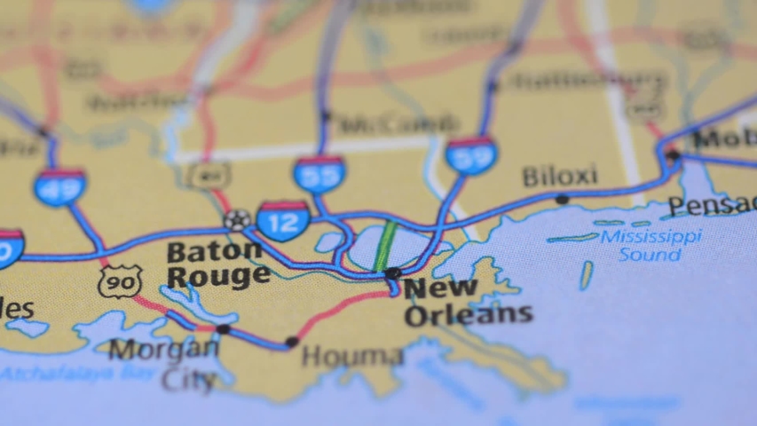Close up view on street map with marker, around the city of New Orleans, USA