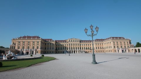 VIENNA AUSTRIA - JULY 11. 2019 wide and steady tripod shot Schönbrunn / Schonbrunn Palace, inner ward with historic street lamp, inner yard of Schönbrunn Palace building, no sound