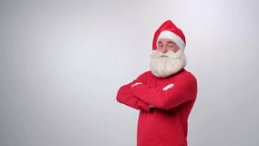 portrait of handsome man dressed as Santa Claus on a white background
