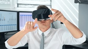 Stock Trader Wearing Virtual Reality Glasses And Using Virtual Business Interface