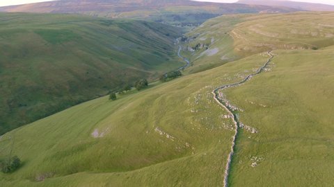 Drone footage in the Yorkshire Dales of a small water near Parsons Pulpit, Arncliffe, North Yorkshire UK