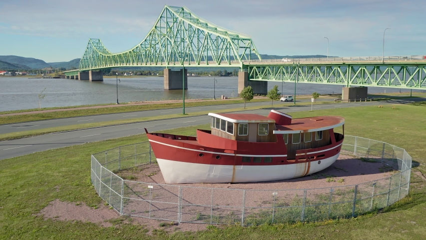Aerial: Tug Boat in the the seaside town of Campbellton, New Brunswick, USA 