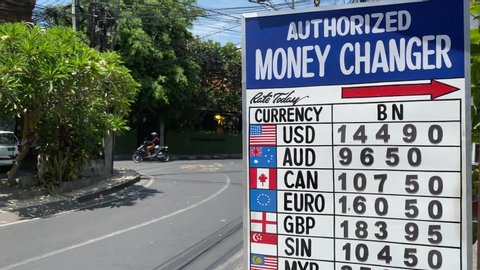 BALI, INDONESIA. 2-019 Dec 1st. Currency and Money Exchange price Board in Street