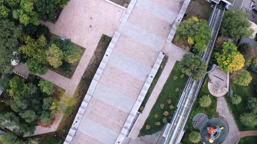 Looking down at Potemkin Stairs in Odessa Ukraine as camera rises and rotates 4K