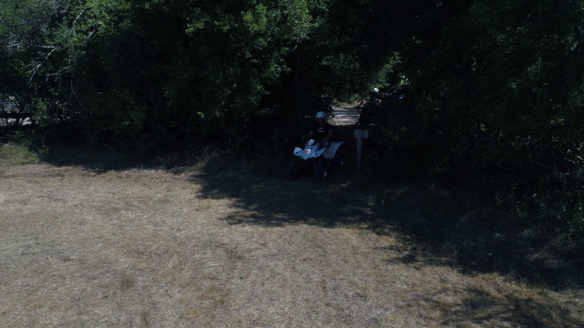 atv riders quad vehicles sunny day france