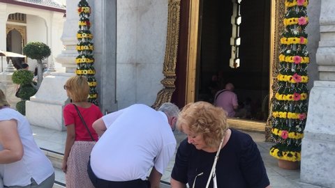 Bangkok Thailand - 24 January 2020 inside the City Pillar Shrine.People walk insid to pray worship with City Pillar Shrine.30 fps.best footage of Tourist Attractions.