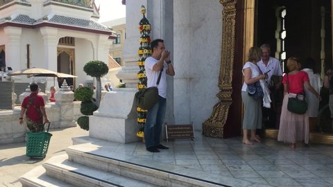 Bangkok Thailand - 24 January 2020 inside the City Pillar Shrine.People walk insid to pray worship with City Pillar Shrine.30 fps.best footage of Tourist Attractions.