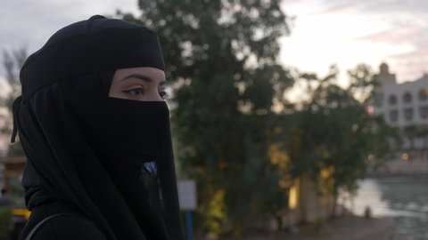Arabian Muslim woman wearing hijab, niqab, chador, burqa dress and Abaya. burqa and abaya are two different kinds of clothing that are available to Islamic women. 