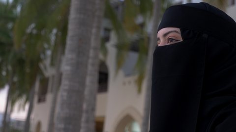 Arabian Muslim woman wearing hijab, niqab, chador, burqa dress and Abaya. burqa and abaya are two different kinds of clothing that are available to Islamic women. 