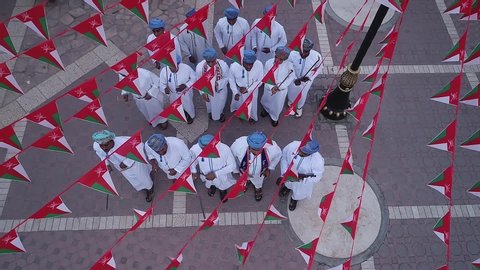 Nizwa, Aldahliyah/Oman - November  16, 2019 : Arial shot of Omani folk band performing Omani traditional dance . 