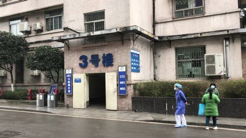 Wuhan, Hubei , January 25, 2020. Chinese Coronavirus treatment in hospital building in hubei. Doctor and nurses are walking to help patients.